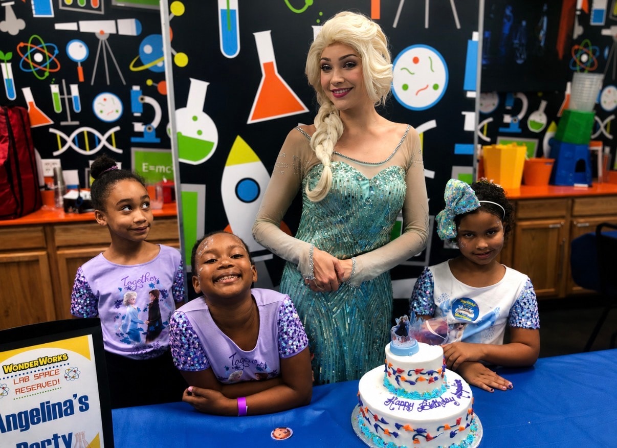 Chase Paw Patrol mascot character with a face-painted birthday girl in front of a Paw Patrol backdrop at a DFW party
